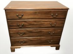 A Victorian mahogany four drawer chest,