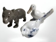 A Royal Copenhagen bear cub, a duck and a further figure of a bird, longest 15 cm.