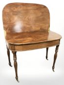 A Victorian mahogany turnover top tea table, width 92 cm.