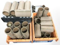A quantity of terracotta drain pipes.
