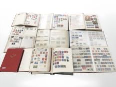 Eleven albums of world stamps.