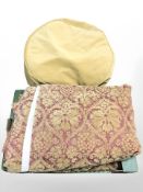 A pair of curtains and a pouffe.