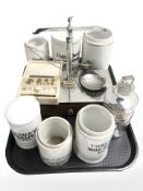 Six glazed pottery chemists bottles, a further glass bottle,