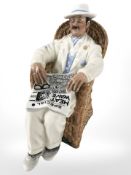 A Royal Doulton figure 'Taking Things Easy' HN2680.