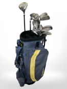 A Wilson golf bag containing Wilson, Dunlop,