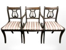 A reproduction mahogany set of six dining chairs in the Regency style