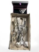 A group of silver plate including asparagus lifters, grape scissors, set of Mappin & Webb skewers,
