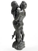 A bronzed resin figure of two lovers, height 36 cm.