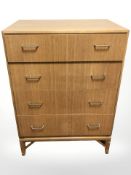 A 20th century teak four drawer chest, 69 cm x 47 cm x 95 cm.