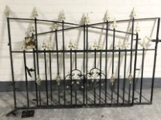 A pair of wrought iron gates,