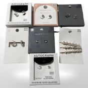 Six pairs of modern costume earrings mounted on card, and three further brooches.