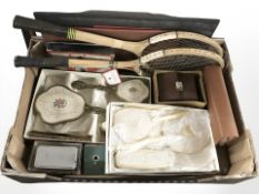 Two dressing table brush and mirror sets, a gents travel set, two vintage tennis rackets,