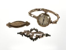 An early 20th century lady's wristwatch with 9ct gold back and rolled gold bracelet,