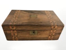 A Victorian inlaid walnut writing slope.