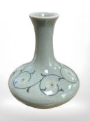A Chinese squat vase, signed to base, height 12 cm.