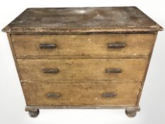 A Victorian scumbled pine three drawer chest, 96 cm x 51 cm x 85 cm.