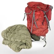 A mountaineering rucksack, sleeping bag, canteen.