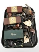 A collection of pipes, including Ben Wade, Peterson of Dublin, etc.