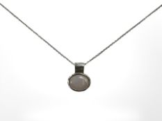 A 9ct white gold synthetic opal pendant on 9ct white gold chain, length 46 cm.