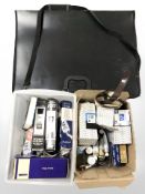 An artists folio, various paints and other art supplies.