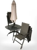 A metal and glass garden table,