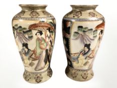 A pair of 20th century Japanese export crackle glazed vases depicting geisha, height 25 cm.