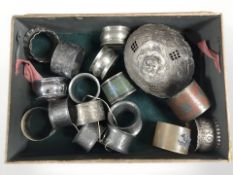 A group of napkin rings including Chinese and Indian enameled examples, Chinese white metal dish,