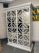 A contemporary white painted oak double door wardrobe with fretwork mirrored doors, height 225 cm,