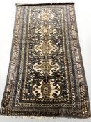 A Balouch rug, Afghanistan, 201 cm x 109 cm.