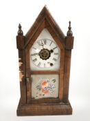 A 19th century American mantel clock, height 39 cm.