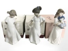 Three boxed Nao figures of girls, No. 1107, 1109 and 1110.
