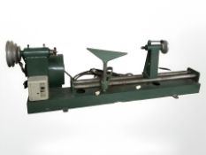 A woodworking lathe, length 106 cm.