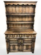 A reproduction oak dresser,