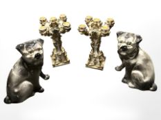 A pair of ornate resin candelabra and a pair of pottery fireside dog ornaments, height 22 cm.