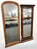 A 19th century continental mahogany mirror and a further walnut example, tallest 128 cm.