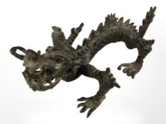 A Chinese bronze figure of a dragon, length 16 cm.