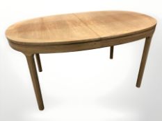A Nathan teak extending dining table, 155 cm x 100 cm x 75 cm.