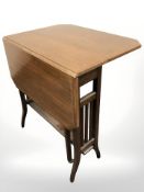 An inlaid mahogany Sutherland table