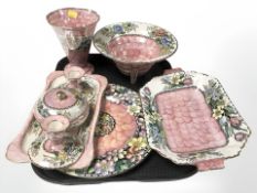 A group of Maling pink lustre dressing table ceramics, vase, fruit bowl, etc.