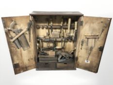 A pine joiner's wall cabinet containing assorted carpentry tools, Record No.