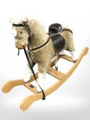 A Mamas & Papas rocking horse.