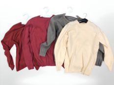 Eighteen various woolen jumpers, vests, etc, various brands and sizes.