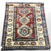 An Afghan rug of caucasian design, 134 cm x 108 cm.