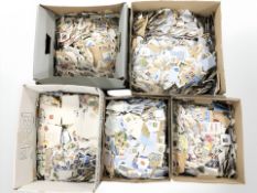 Several thousand loose 20th century stamps.