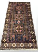 A Balouch rug, Afghanistan, 205 cm x 104 cm.