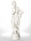 A resin figure of a Greek lady, height 63 cm.