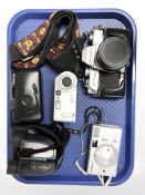 Several vintage cameras including Minolta, Mamiya, a pair of Sigma 10x25 binoculars.
