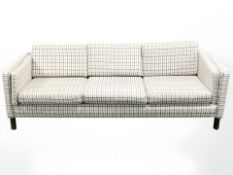 A late 20th century Danish three seater settee in checkered fabric, 211 cm x 80 cm x 75 cm.