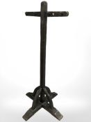 An oak cruciform hat and coat stand, height 179 cm.