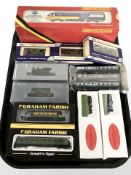 A group of OO and N gauge die cast rolling stock including Hornby, Dapol, Graham Farish, etc.